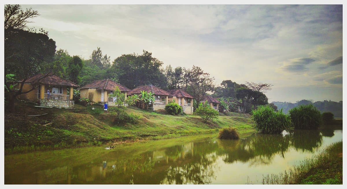 The Silver Oaks in Chikmagalur is a 10-acre eco-friendly resort surrounded by lush greenery, offering cozy cottages and villas